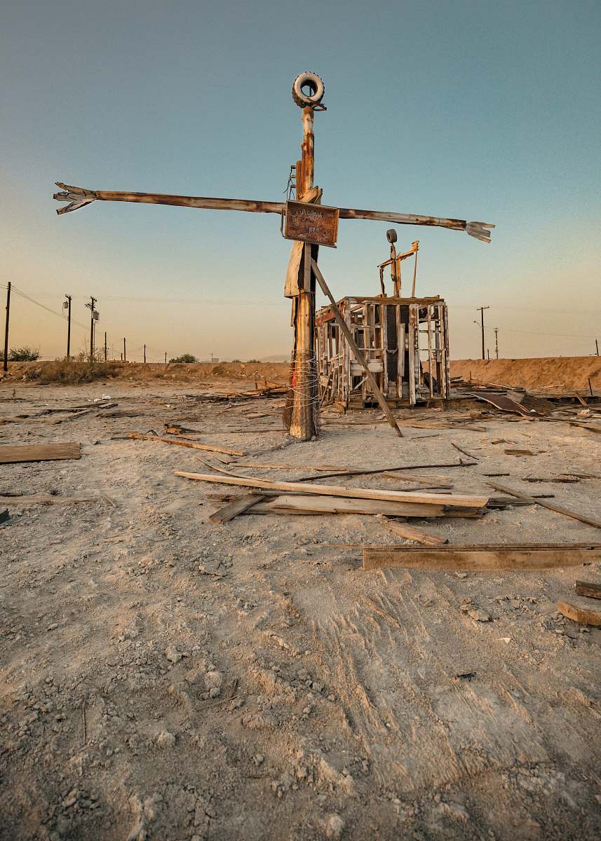 salton sea brown wooden cross barren